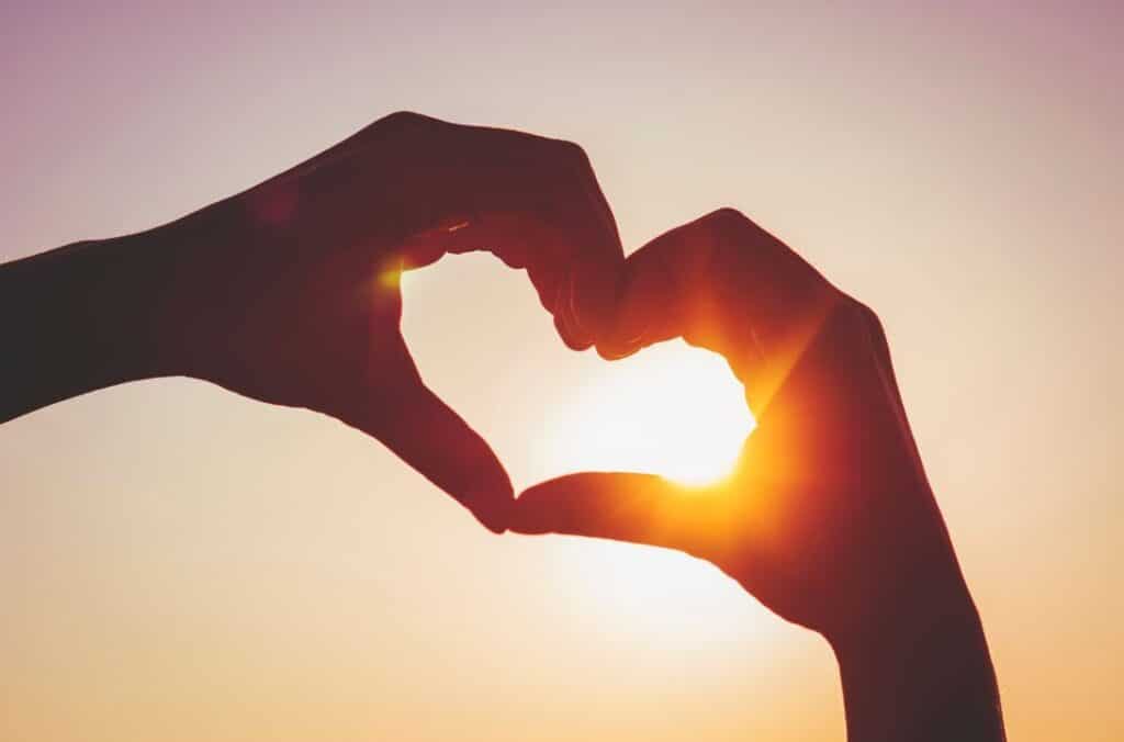 Love shape formed with 2 hands. MyOptimalbrain.com