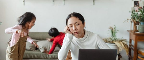 Tired-working-mother-at-home