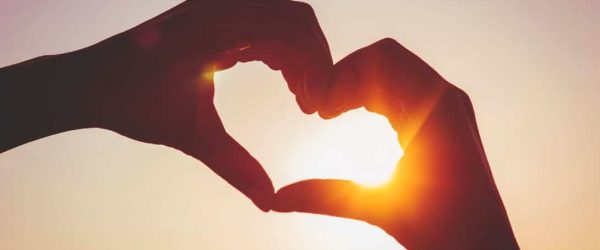 Love shape formed with 2 hands. MyOptimalbrain.com